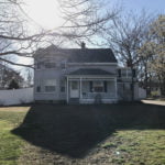 After photo of roofing installation and siding repair