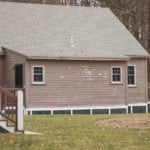 everlast advanced composite siding installed at Camp Wonderland in Sharon, Massachusetts