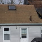 before photo showing old roofing shingles.