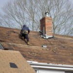 stripped roofing system before new roofing shingles