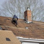stripped roofing system before new roofing shingles