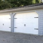 new garage doors on this exterior renovation in Medfield Massachusetts
