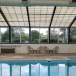 After photo of the interior pool house showing new patio sliding doors and thermolite