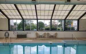 After photo of the interior pool house showing new patio sliding doors and thermolite