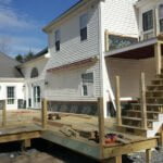 Installation of new Pressure treated wood deck.