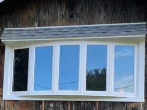 Home's Curb Appeal enhanced with this Bow window installation in Avon, Massachusetts