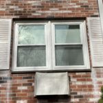 after photo of the exterior showing new vinyl harvey classic replacement windows installed