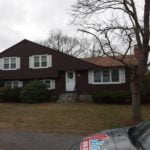 before photo of old wood shingle siding