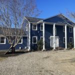 after photo showing front of home with installation using CertainTeed Monogram vinyl siding.