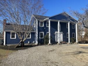 after photo showing front of home with installation using CertainTeed Monogram vinyl siding.