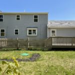 back elevation of vinyl siding installation