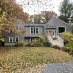 After Photo of Reliable replacing an old roof, installing new home siding, and replacement of new windows.