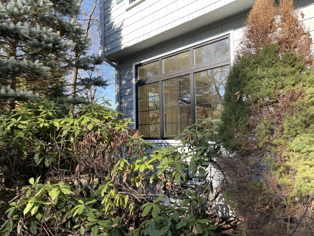 Enlarging The Windows in Westwood, Massachusetts providing increase in natural light to the home.