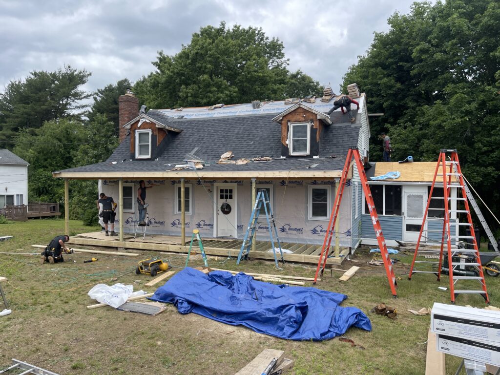 in progress roofing installation of complete exterior renovation in walpole, ma.