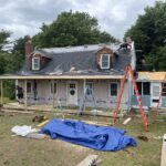 in progress roofing installation of complete exterior renovation in walpole, ma.