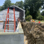 installing pressure treated lumber for the sill plate on new foundation in east bridgewater, ma.