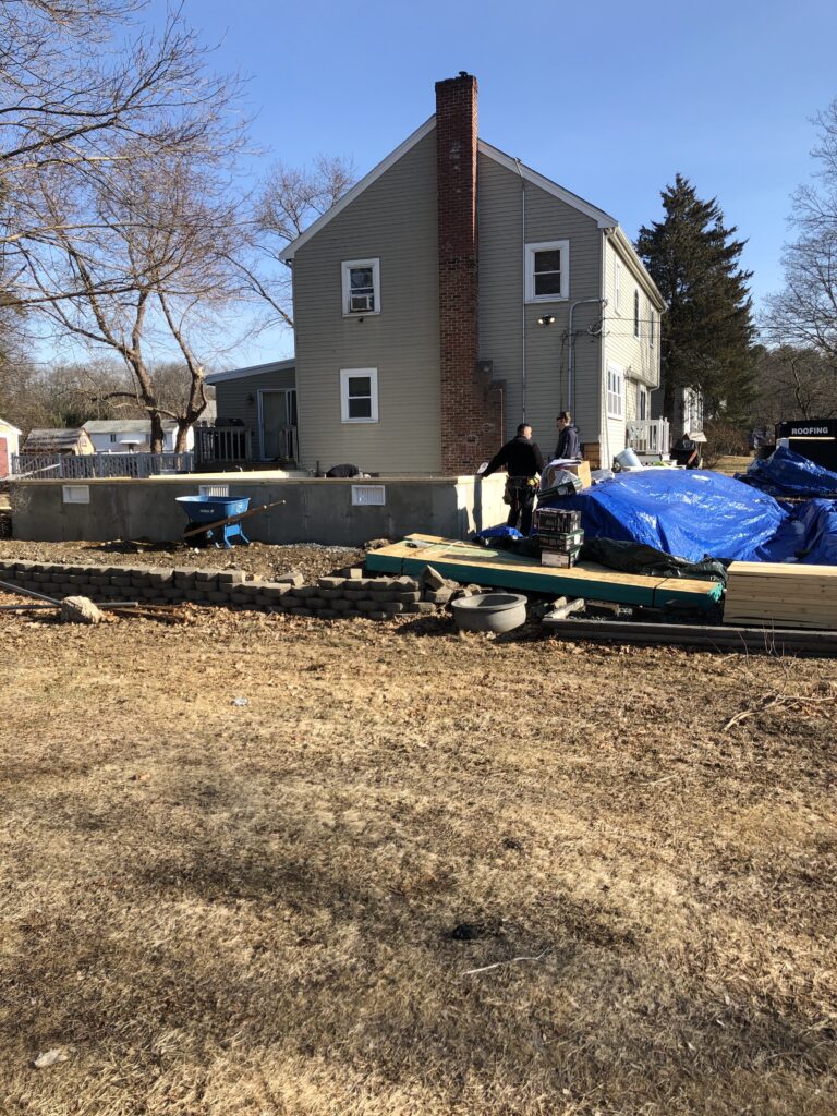 conventional house addition foundation getting ready for framing