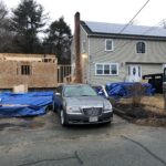 framing phase in progress for home addition project in stoughton, ma