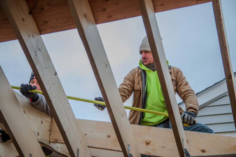 roof rafters being installed at our home addition in stoughton, massachusetts