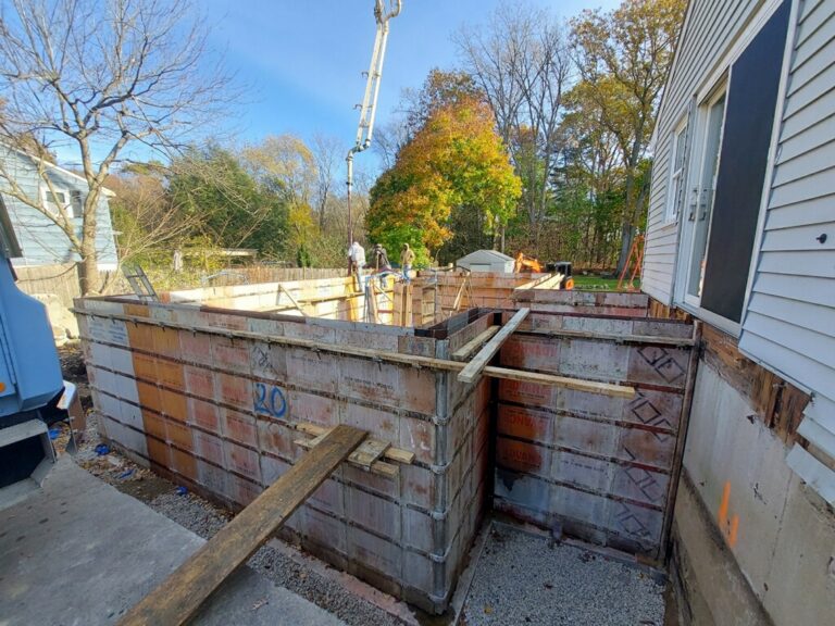 Concrete forms set up for the 8 foot basement walls that are being poured at our in-law addition in Stoughton, Massachusetts.
