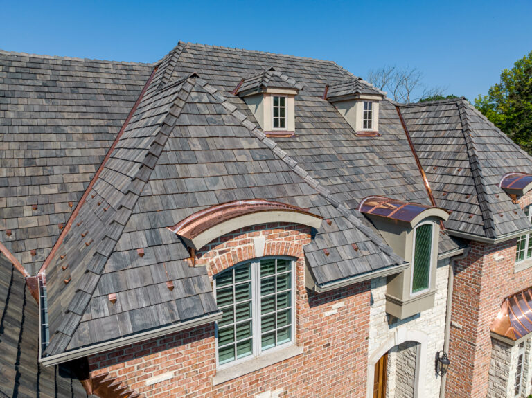 Brava cedar shake synthetic installation with copper accent flashing and roofing