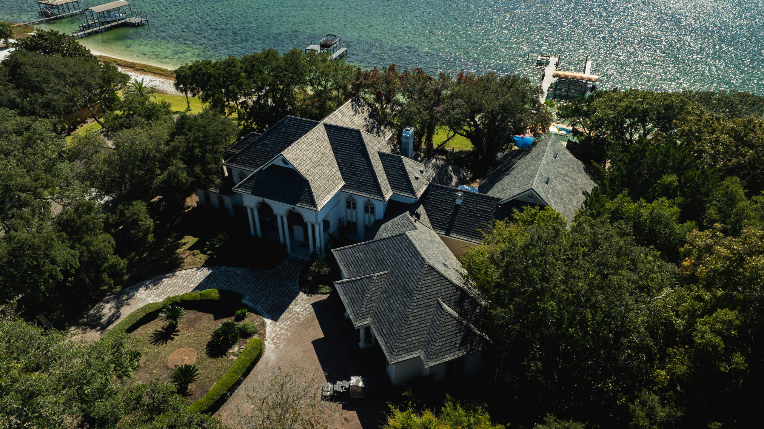 Synthetic slate roofing by Brava Roof Tile installed at a coastal property.