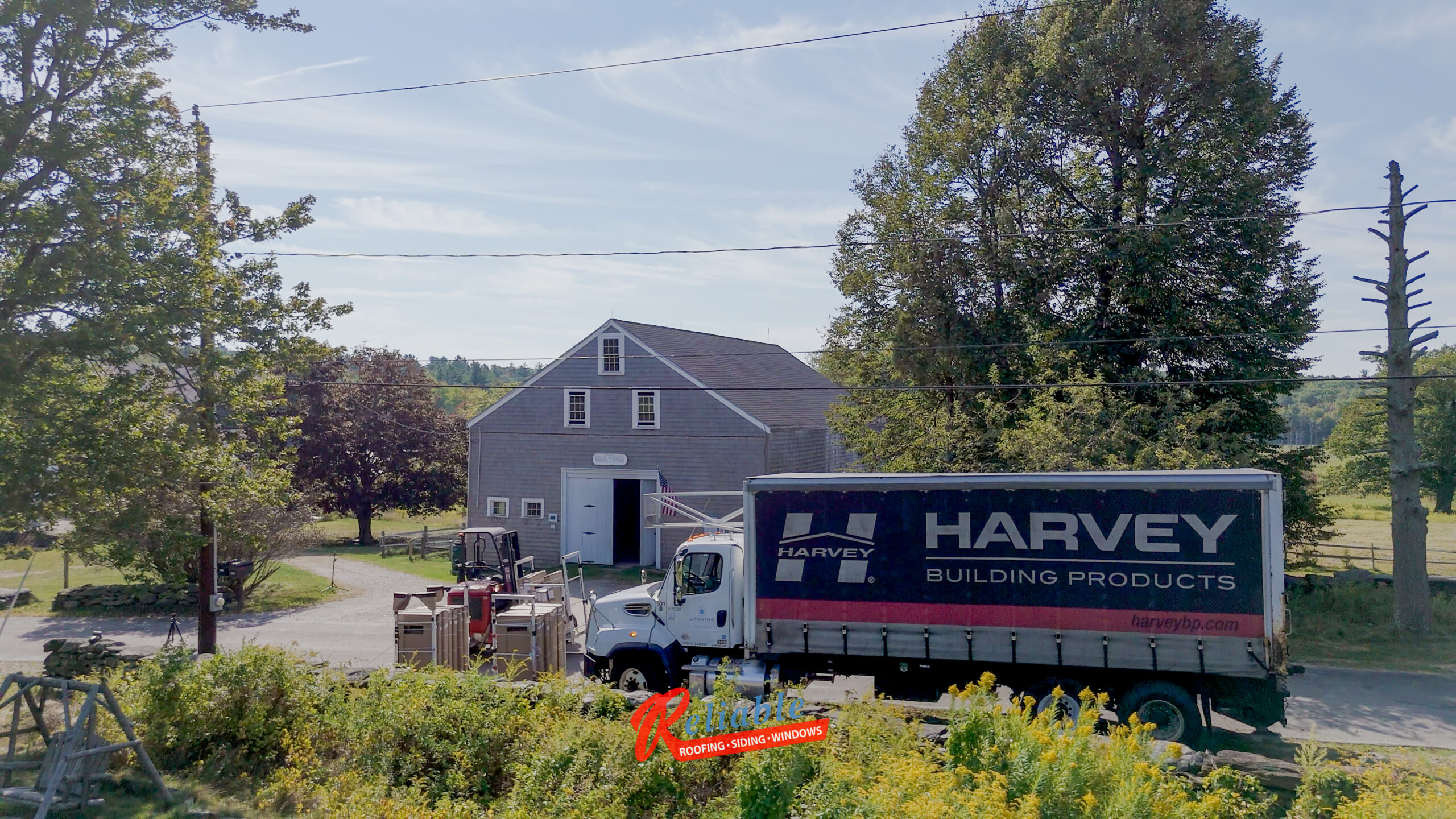 delivery from Harvey windows of their majesty wood windows at Mass Audubon Wachusetts Meadow Wildlife Sanctuary in Princeton, MA